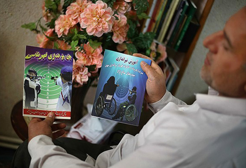 (تصاویر) جانباز قهرمان (تصاویر) جانباز قهرمان