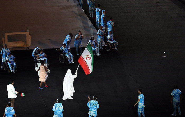 (تصاویر) پرچمدار ایران در ریو با لباس احرام رژه رفت (تصاویر) پرچمدار ایران در ریو با لباس احرام رژه رفت