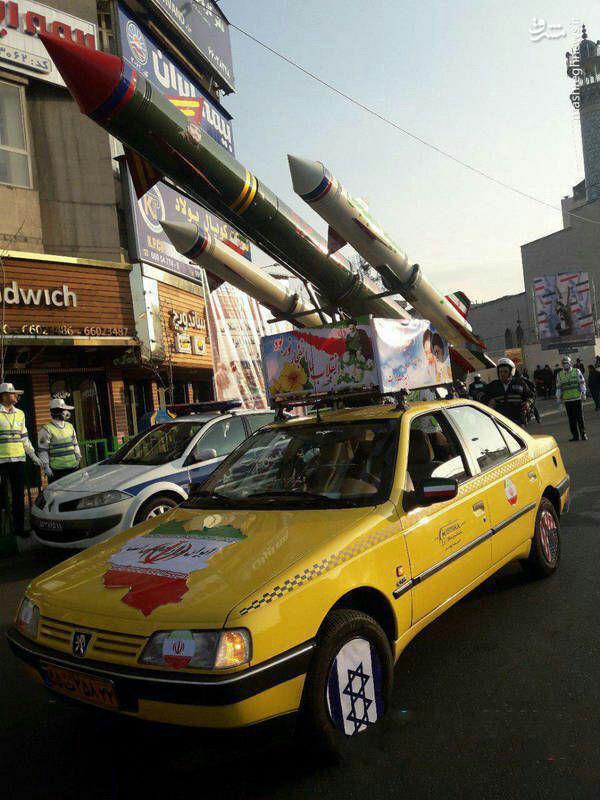 (تصویر) تاکسی حمل موشک در راهپیمایی ۲۲ بهمن