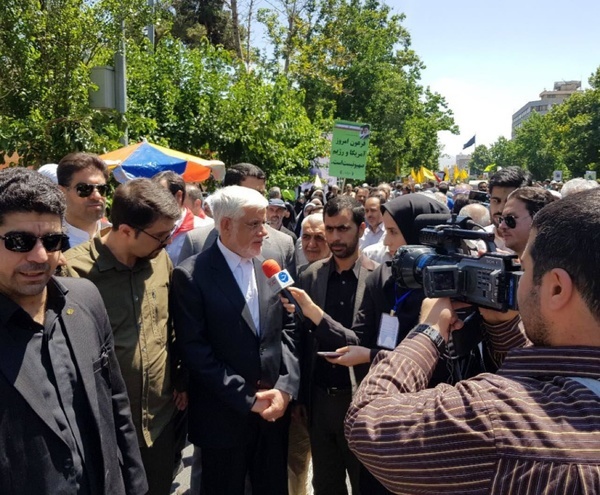 (تصویر) حضور دو رقیب ریاست مجلس در راهپیمایی