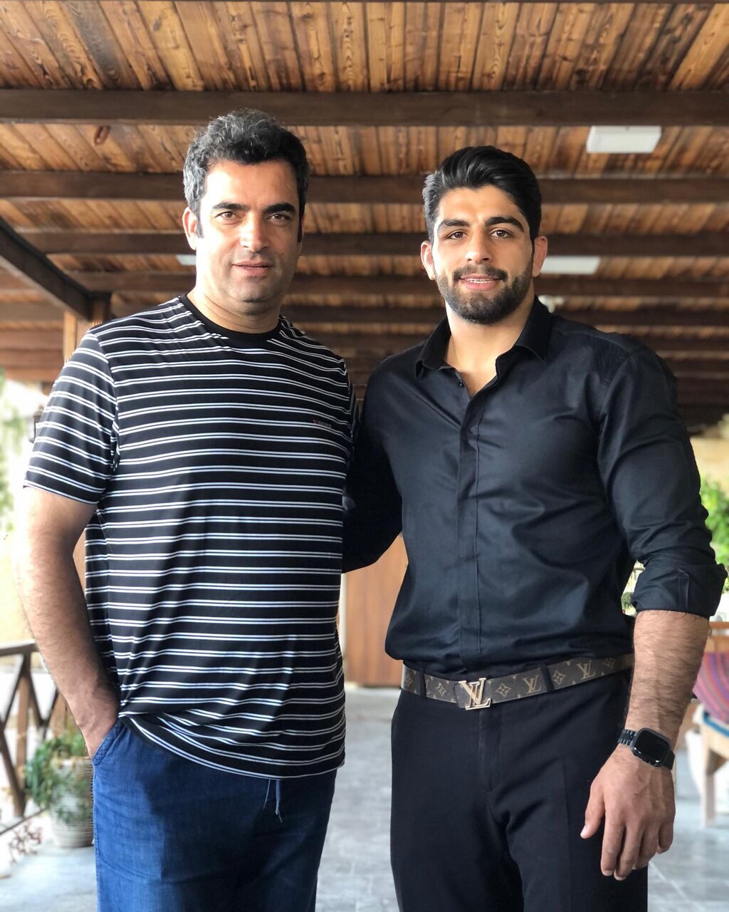 عکس‌ صمیمی منوچهر هادی با قهرمان المپیک